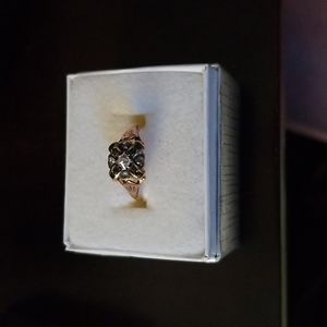 Vintage mine cut diamond and emerald ring